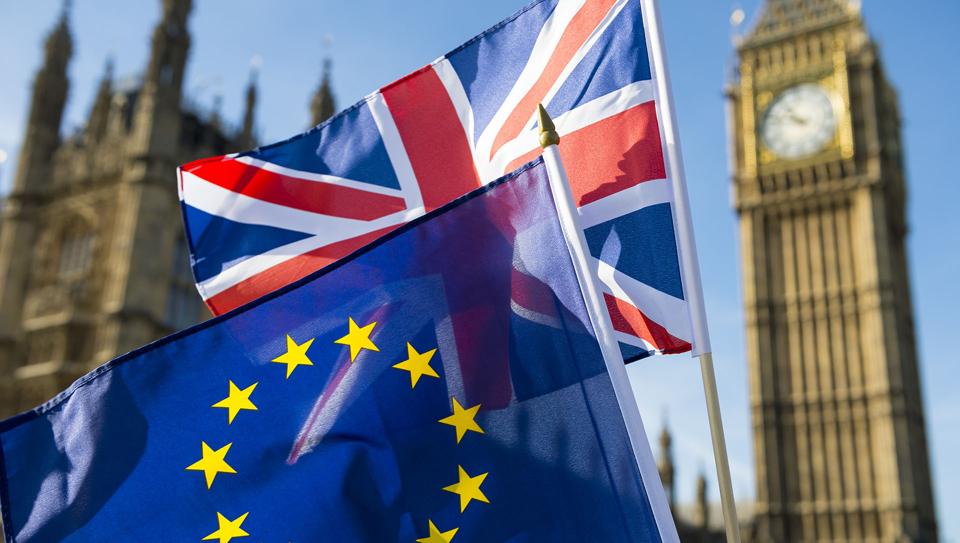 European Union and British Union flag flying in front of Big Ben